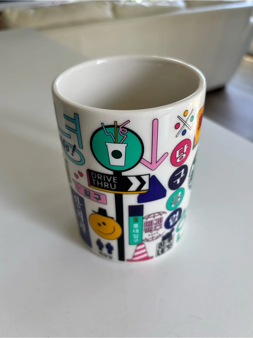 Starbucks White Mug with Teal Handle and Hangeul Sticker Graphics from Korea